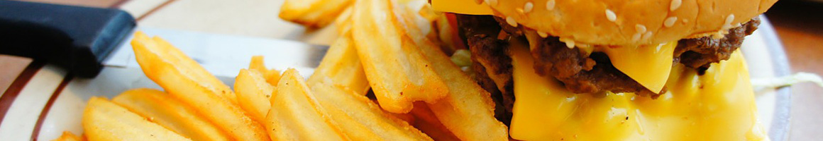 Eating Burger Fast Food at Roy Rogers restaurant in Alexandria, VA.